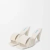 Sandália tipo «slide» em pele de borrego com efeito «origami» Sandália tipo «slide» em pele de borrego com efeito «origami»