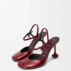 Sapatos de salto alto com tira no tornozelo «Toy Pump» em pele de borrego envernizada macia Sapatos de salto alto com tira no tornozelo «Toy Pump» em pele de borrego envernizada macia